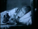 The Lodger (1927)Marie Ault and bed